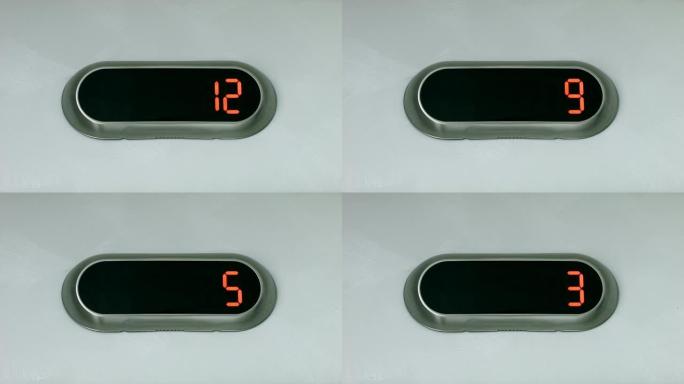 显示楼层编号的数字显示器。电梯下到一楼