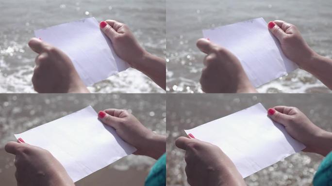 两个视频的纸在海洋-慢动作