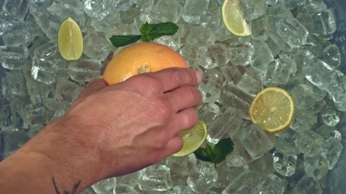 4k冷冰块和手的地方橙色