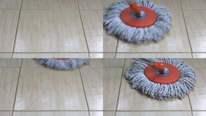 移动的布拖把用于清洁瓷砖地板。