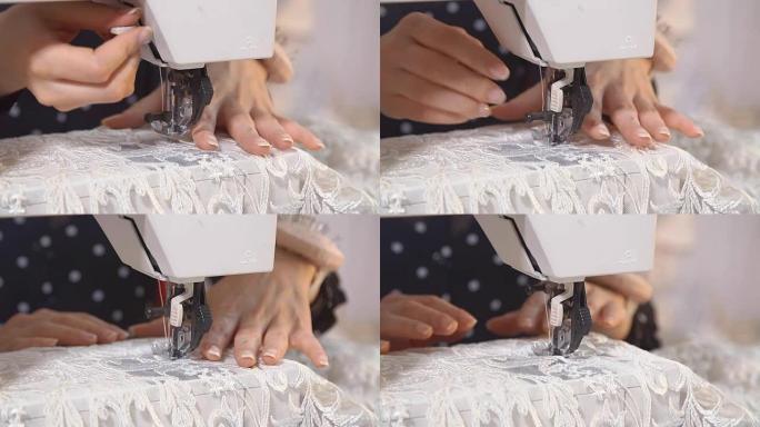 在电机臂架上缝制纺织品特写镜头。手以慢动作推动纺织品通过缝纫机