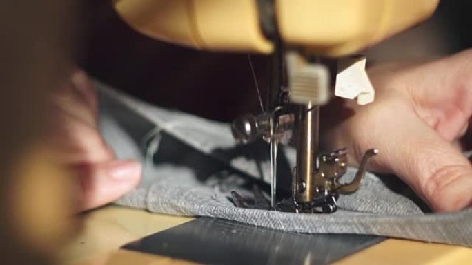 缝纫机上的裁缝特写