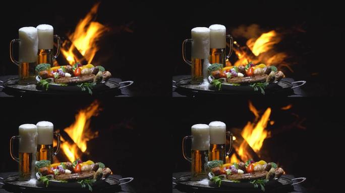 火的背景上的两杯啤酒