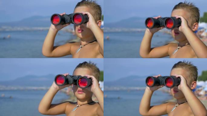 儿童用双筒望远镜探索大海