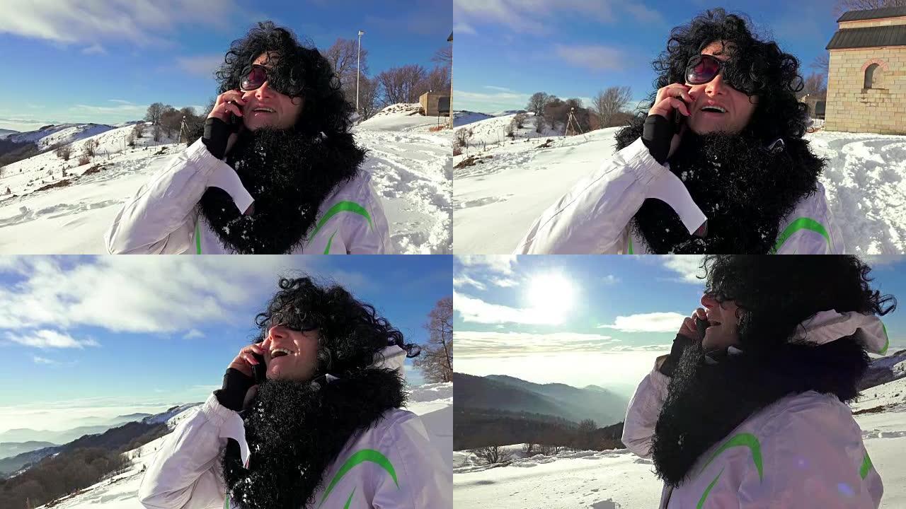 徒步旅行的女人在智能手机上谈论高山雪景。UHD 4k steadycam库存镜头