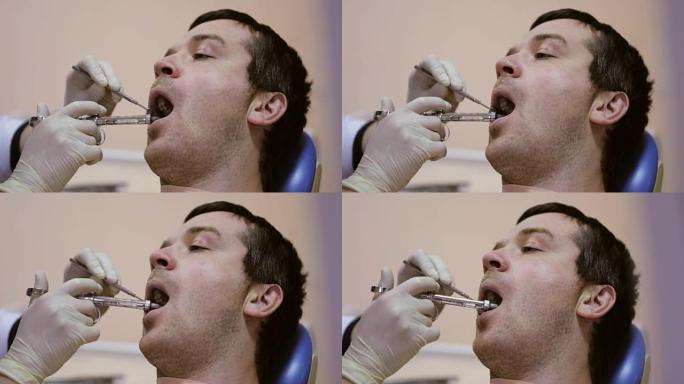 牙科医生在牙科诊所给病人打针