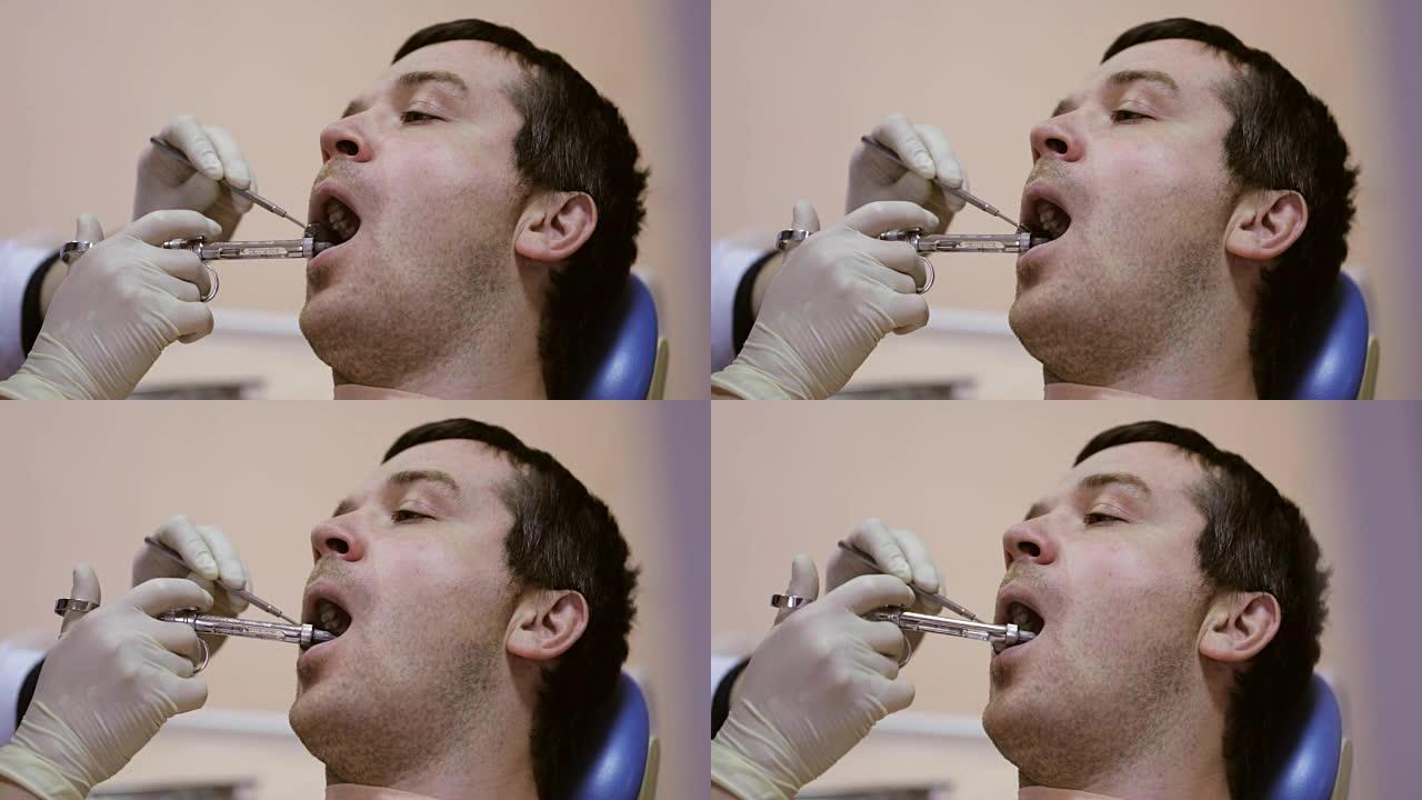 牙科医生在牙科诊所给病人打针