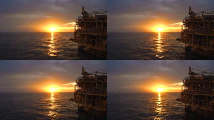 海上油气平台，中央处理平台在日落时间生产的原料气和凝析油或原油，然后将天然气输送到陆上炼油厂