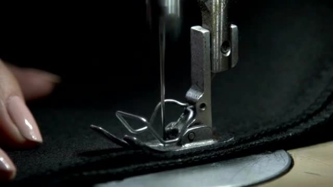 缝纫机零件的特写。脚针。针板。缝纫