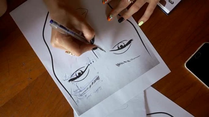 化妆师在纸眉毛上画画