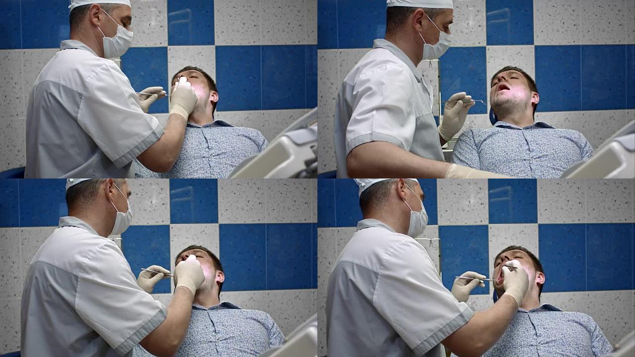 牙科诊所修复牙齿的年轻男性患者