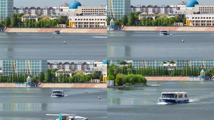 哈萨克斯坦阿斯塔纳。阿斯塔纳伊希姆河上的游船延时过度