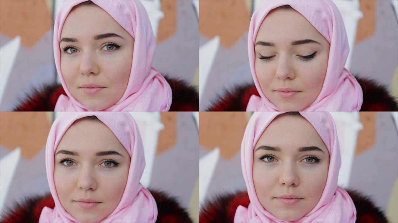 穆斯林妇女，头上盖着粉红色的围巾。全高清视频