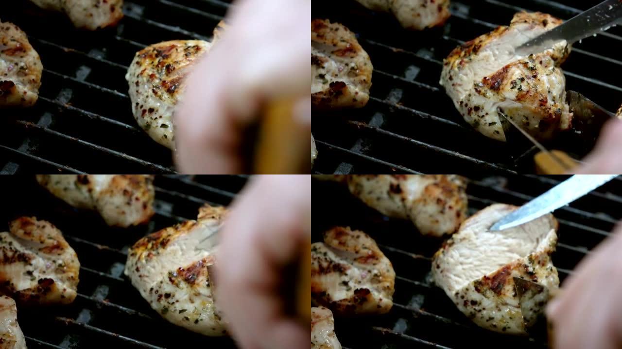 烤架上切鸡肉的视频 -- 真正的慢动作