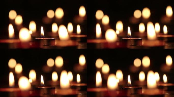 蜡烛灯选择焦点，黑色背景。