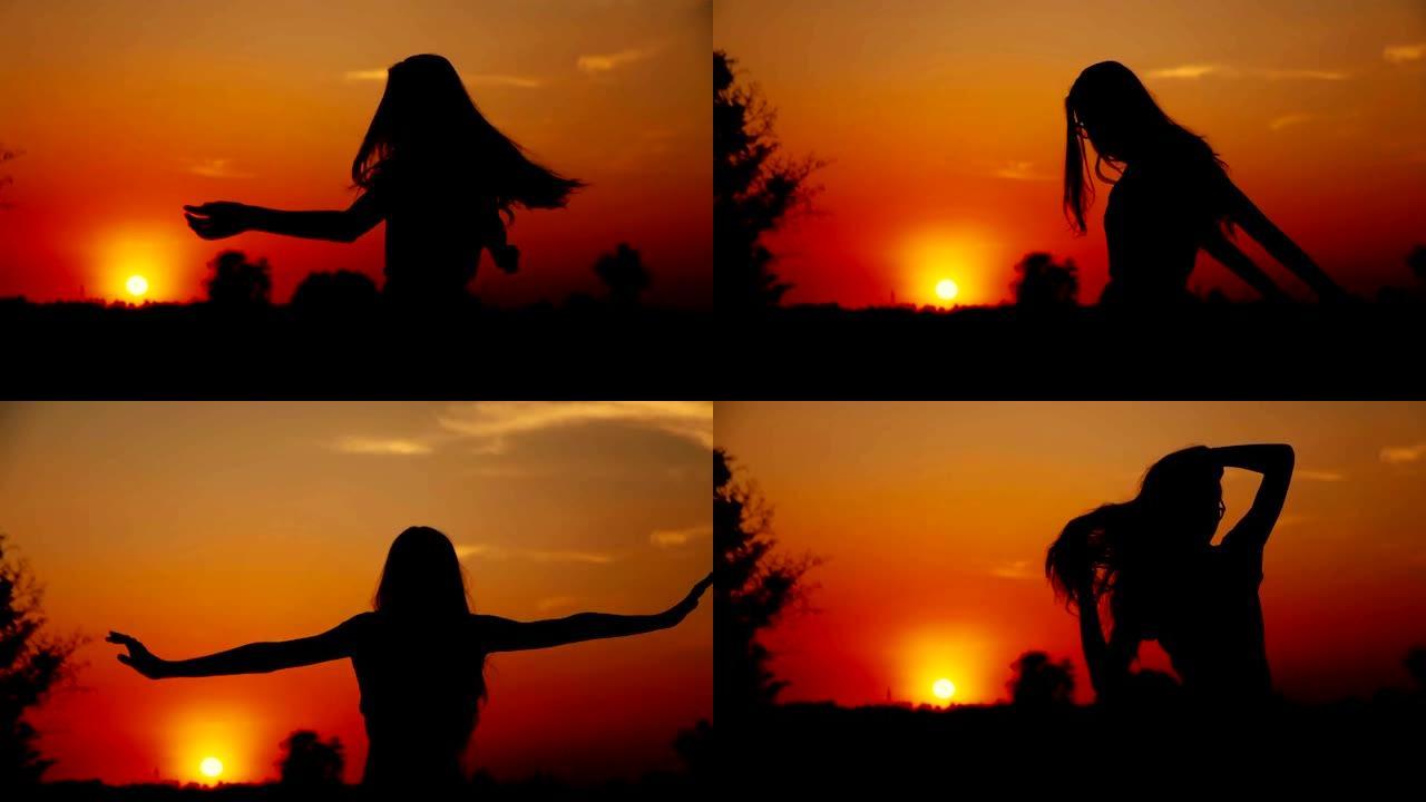 日落时的年轻女子剪影。系列。