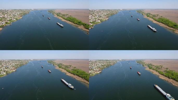 春季，三艘巨大驳船在第聂伯河上移动的空中拍摄