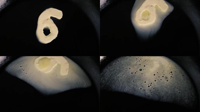 六号黄油在热锅上融化-特写顶视图