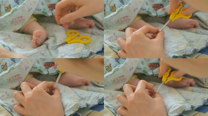 母亲剪婴儿的指甲