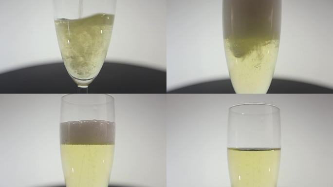 男人把香槟倒在杯子里。特写