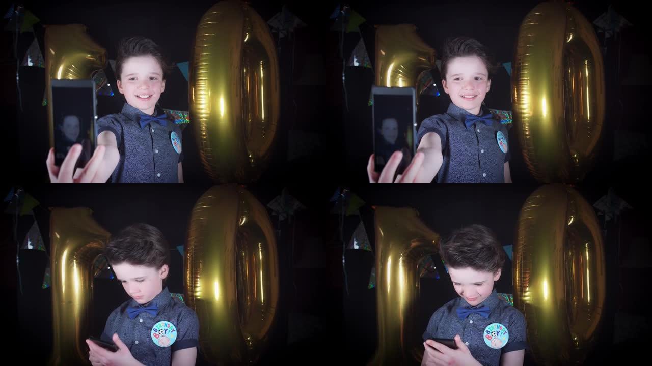 4k派对10岁生日男孩在手机上自拍