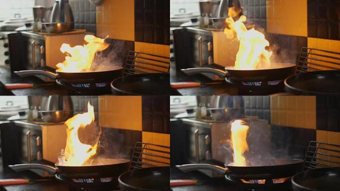 慢动作高清: 煎锅中的燃烧牛肉