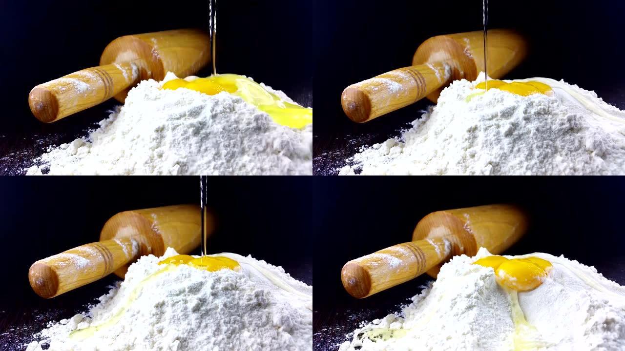 鸡蛋和蛋黄落入面粉中