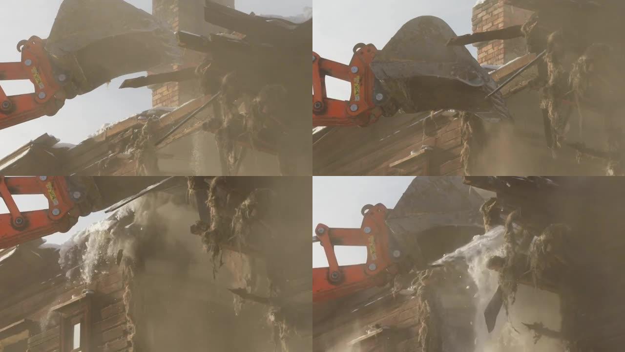 挖掘机的特写镜头打破了木制建筑物，灰尘升起