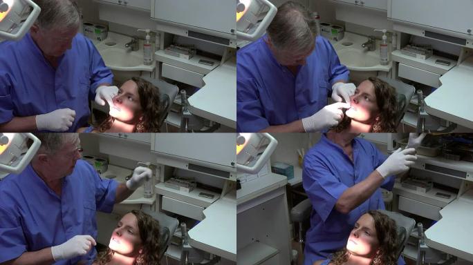 牙医检查他的病人