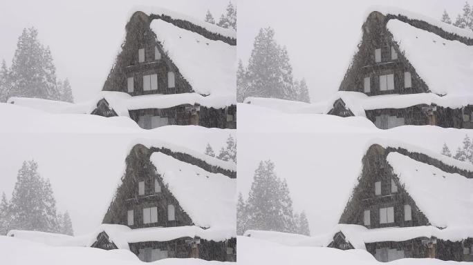 雪落在房子上，在日本富山