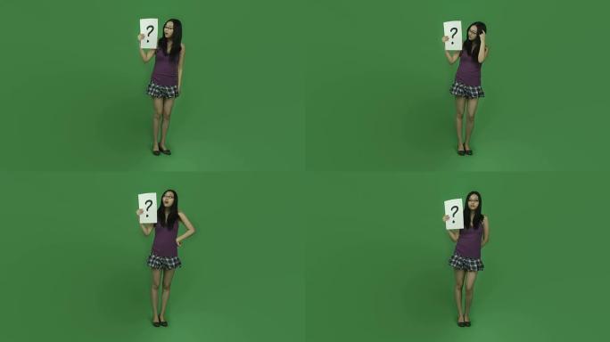 亚洲学生女孩孤立绿屏绿色背景困惑