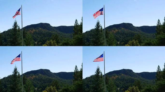 美国国旗在山上高高飘扬
