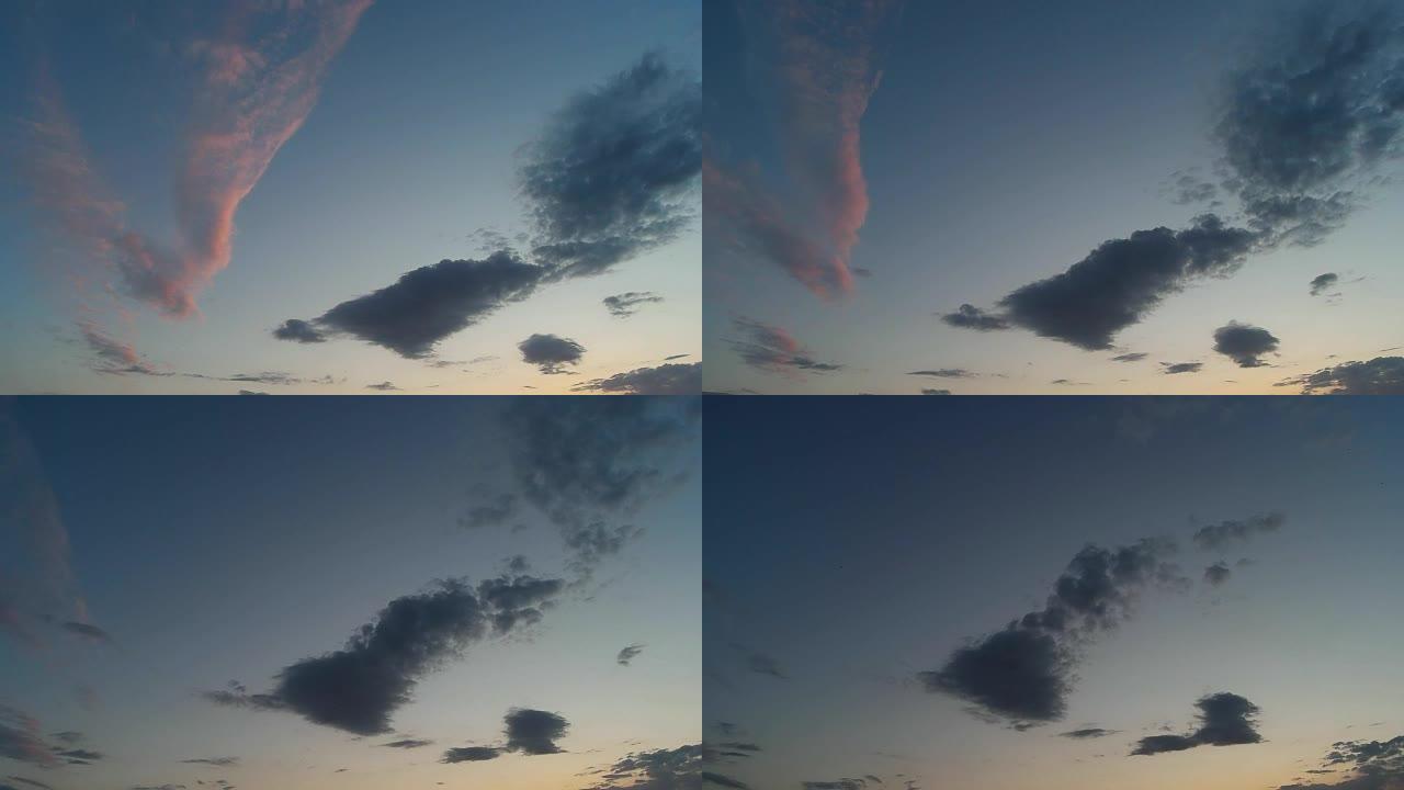 天空中戏剧性的日落。紫粉和乌云在日落时飞翔