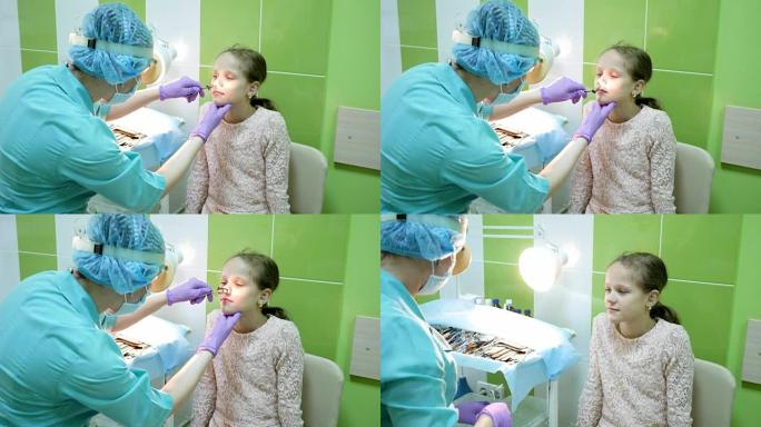 耳鼻喉科儿科医生检查儿童，医疗中心耳鼻喉科医生，儿童程序，医生治疗耳鼻喉科疾病
