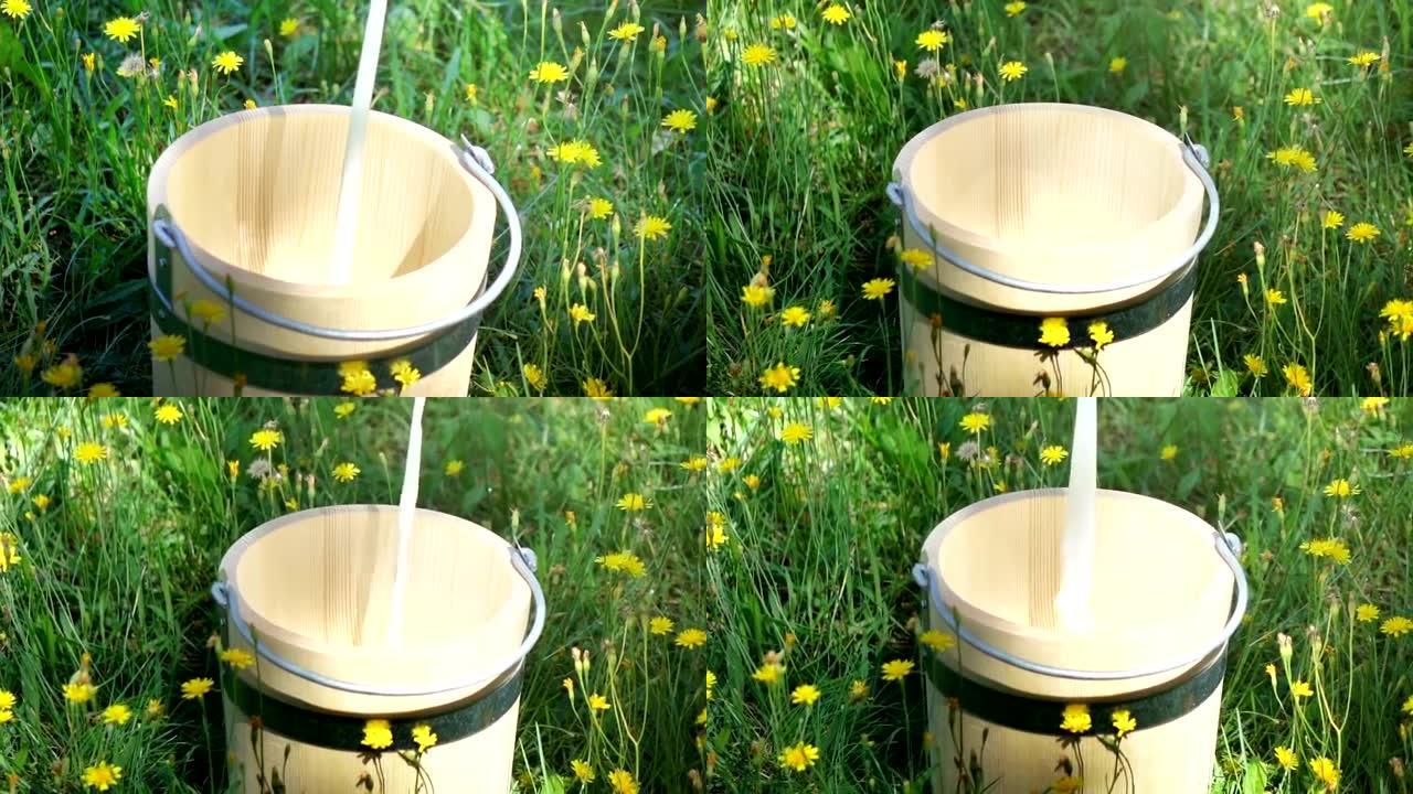 将牛奶倒入木桶中的两个视频-真正的慢动作