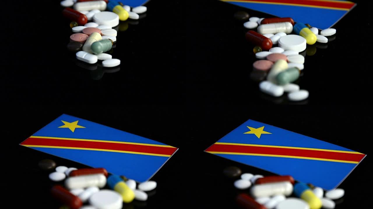 刚果民主共和国国旗，黑色背景上有许多医用药丸