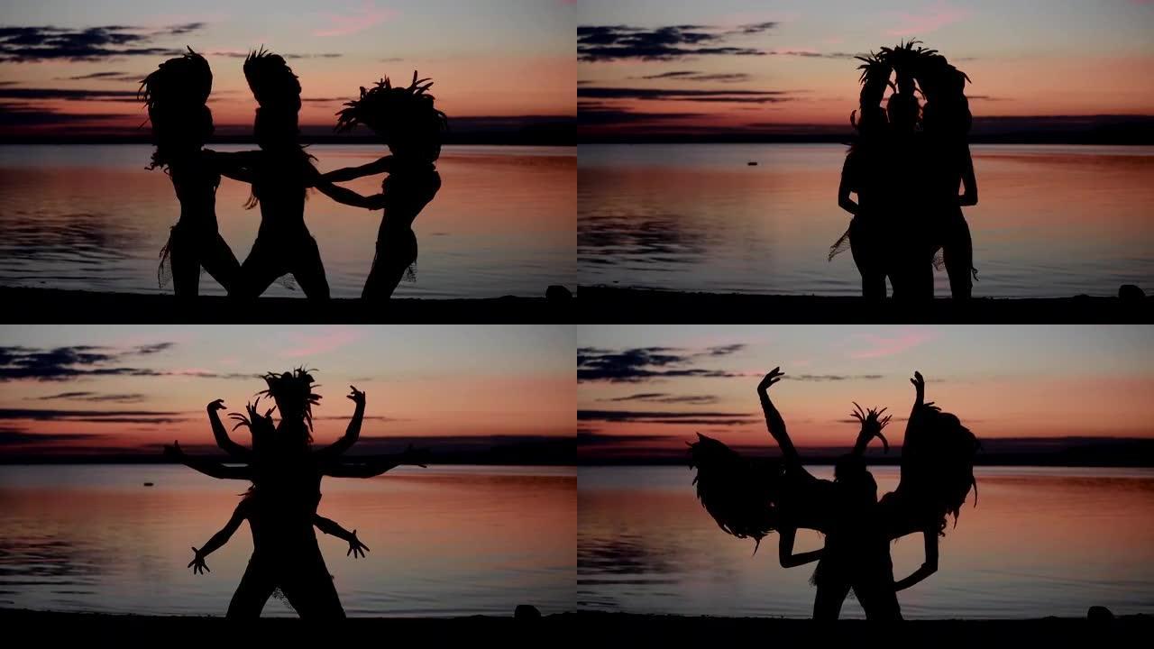 女孩在湖边的日落中跳舞