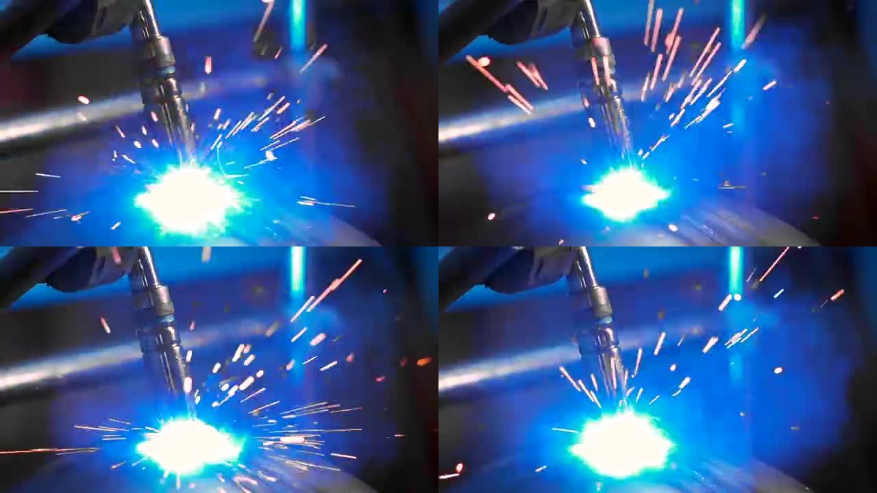 焊接机在生产过程中会产生明亮的火花。焊接机的自动化工作