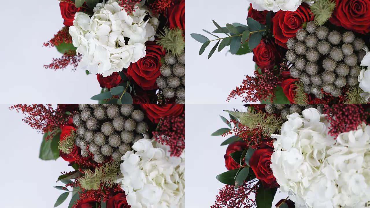 特写，从上面看，花束，白色背景上的旋转，花卉组成由绣球花，玫瑰，布鲁尼亚绿，桉树，Eustoma，s