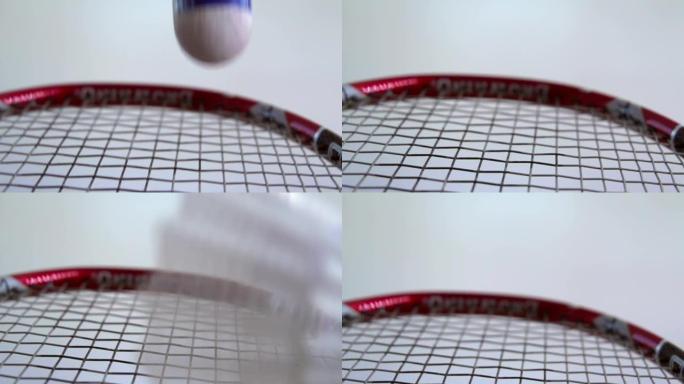 羽毛球对羽毛球拍的慢动作冲击