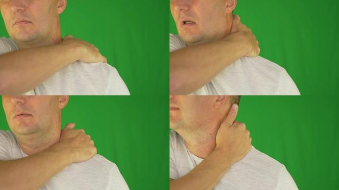 男人用手摩擦脖子和肩膀。极端特写前视图。锁定镜头。