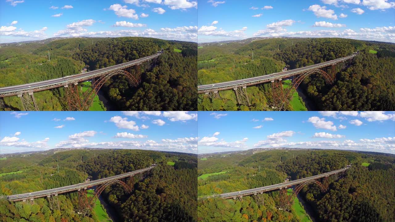 旧钢铁路火车桥天线上方美丽的风景。美丽的空中拍摄欧洲，文化和风景，相机在空中平移。无人机在欧洲陆地上