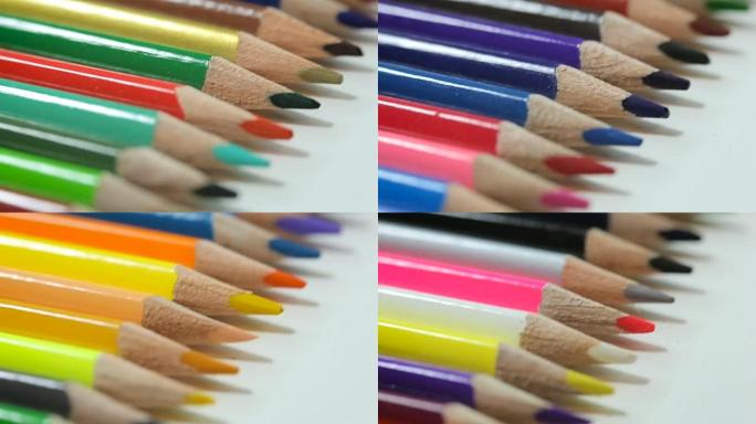 白色桌子上的彩色铅笔