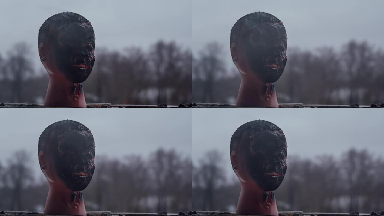 黑色燃烧的人体模型头部特写