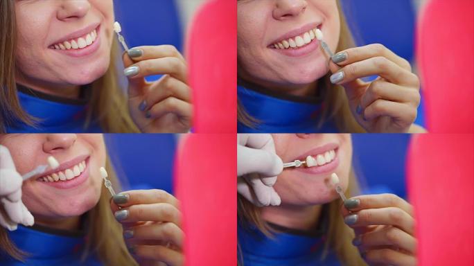 一个女人的嘴巴的特写镜头，她检查她的牙齿是如何漂白的
