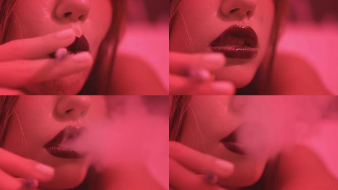 抽烟的女人。性感女人嘴唇上的香烟。女人抽烟