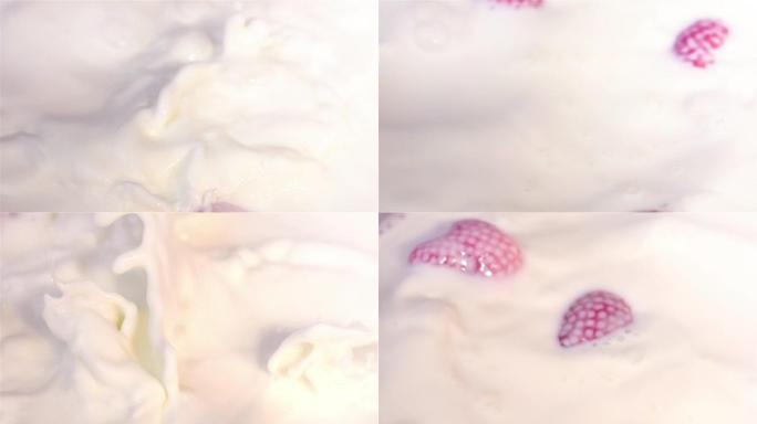 草莓掉入牛奶的两个视频-真正的慢动作