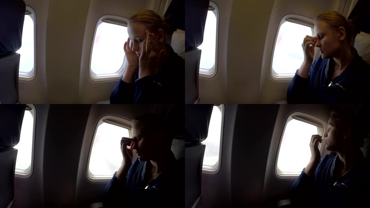 飞机上的女人感到恶心