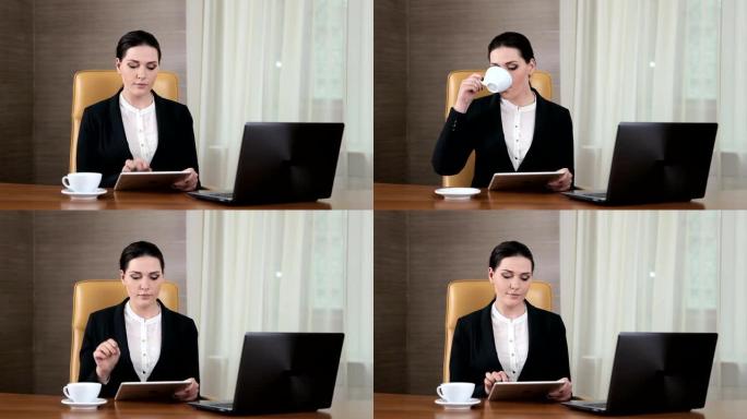 在办公室用平板电脑工作的女人
