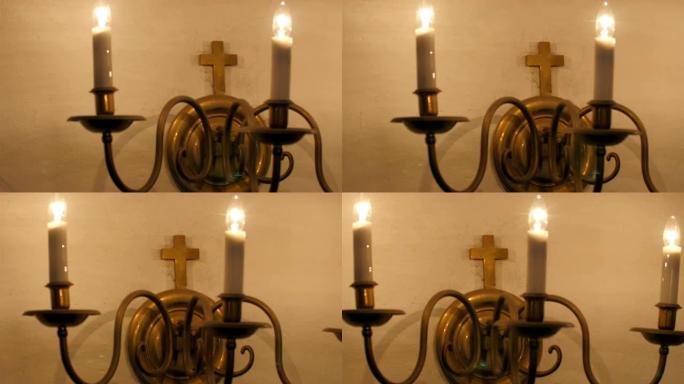 墙上的三个蜡烛状灯泡